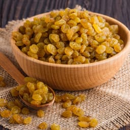 golden raisins in a bowl