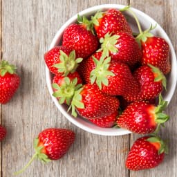 a bowl of fresh strawberries