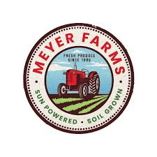 The logo of meyer farms - sun powered - soil grown